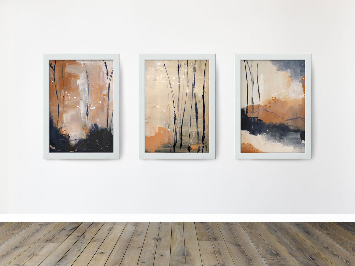 abstract-landscape-painting1-4 Set of three abstract landscape paintings of bare trees shown framed and hung on a white wall