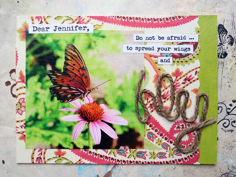 Truth card with patterned paper, a picture of a butterfly, the word fly created with twine, and an inspirational saying