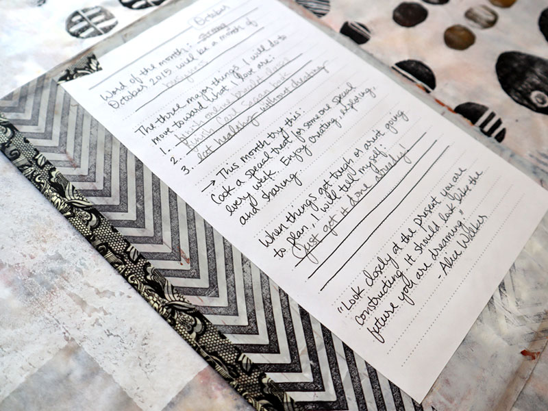 Journal page mounted on mixed media background in black, gray and white