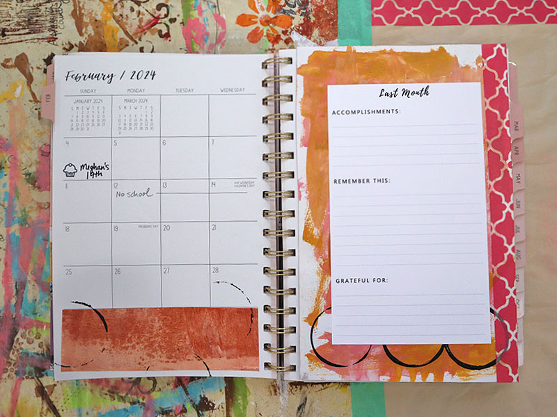 Planner calendar with custom fold-in page added with washi tape