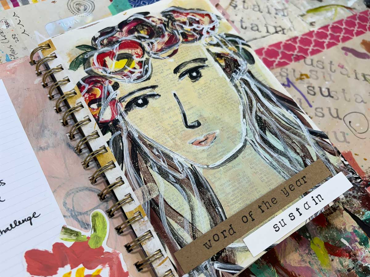 Word of the year art page with a painted abstract female face with red flowers in her hair and the word Sustain at the bottom